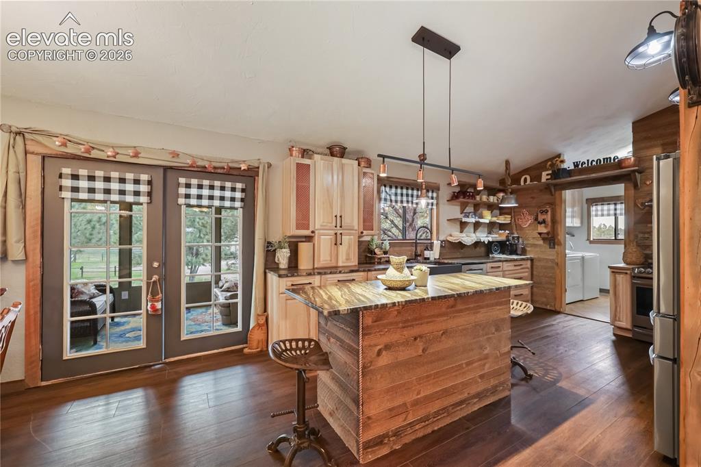 Image 9 of 50: Head out to the sunroom!