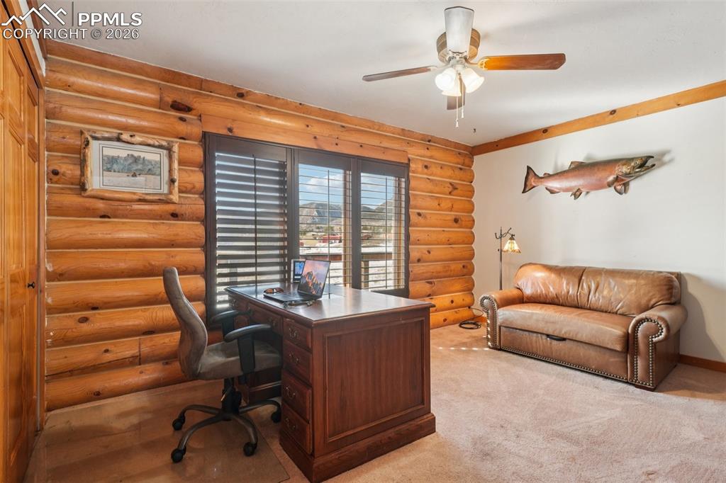 Image 16 of 40: Currently used as an office this is on the main floor and is a conforming b