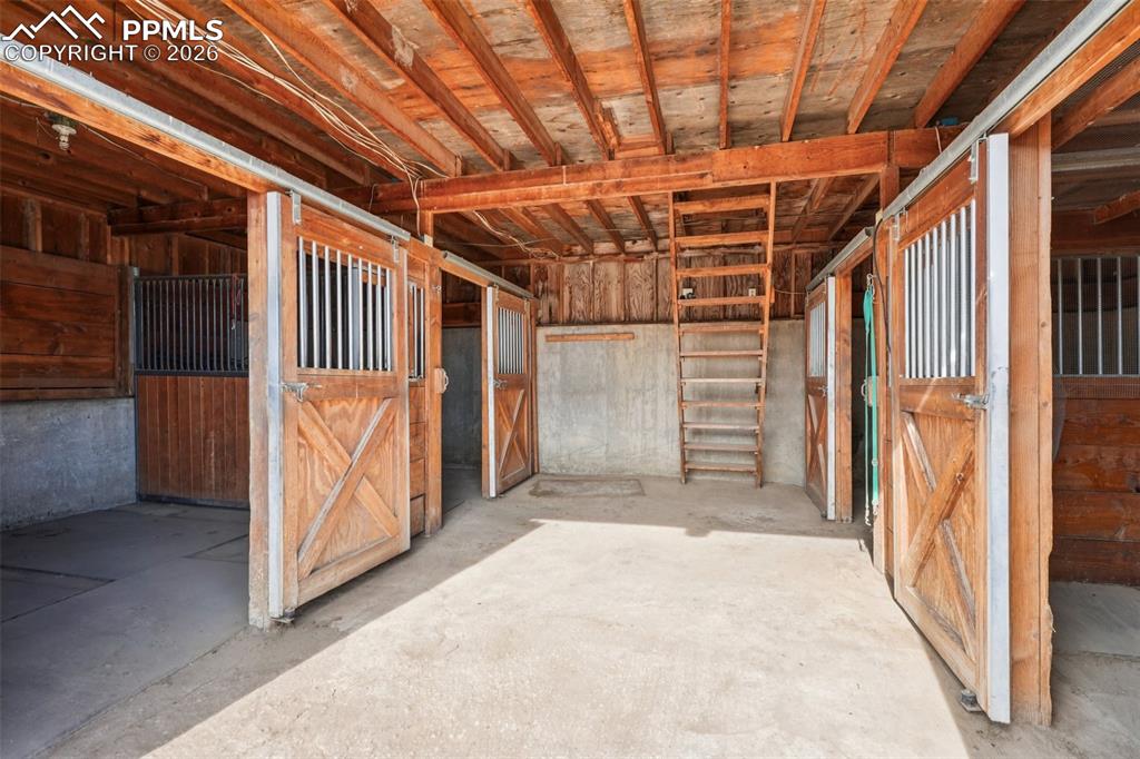 Image 31 of 40: View of horse barn