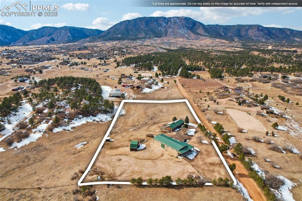 Image 38 of 40: Drone / aerial view of a mountain backdrop