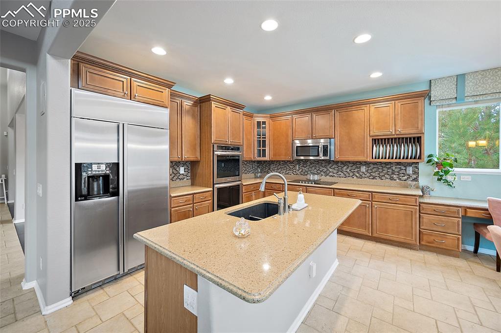 Image 12 of 50: Huge custom refrigerator and double ovens!