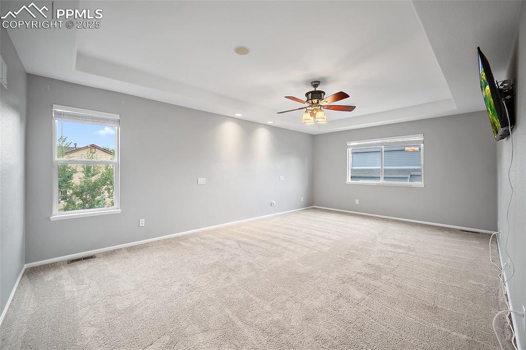 Image 21 of 50: Master Bedroom