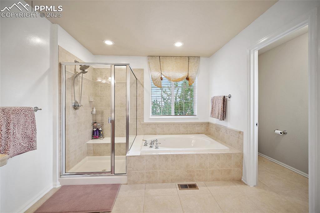 Image 28 of 50: Master Bedroom