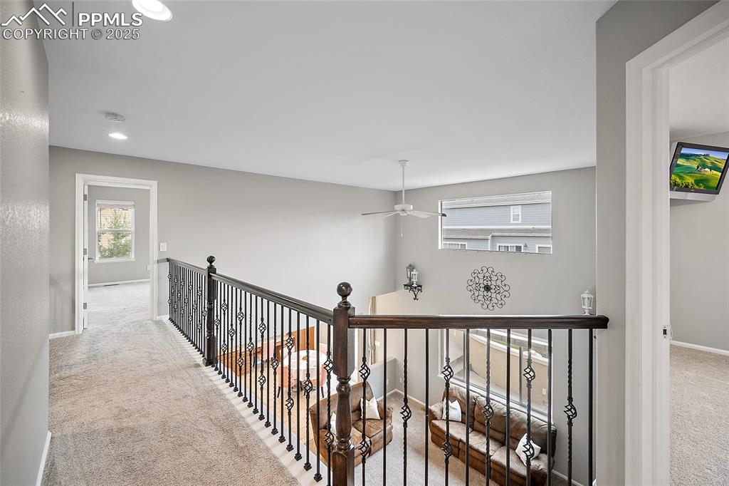 Image 29 of 50: Hallway leading to the Private Primary bedroom. 