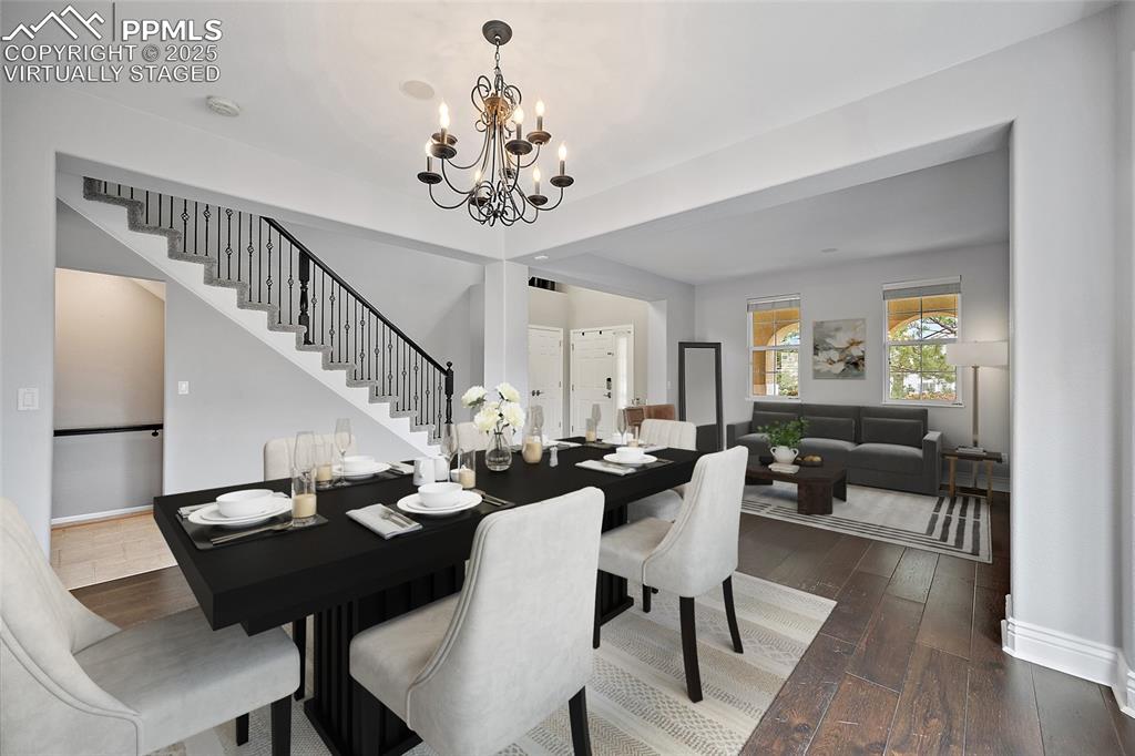 Image 9 of 50: virtually staged Formal dining and living room. 