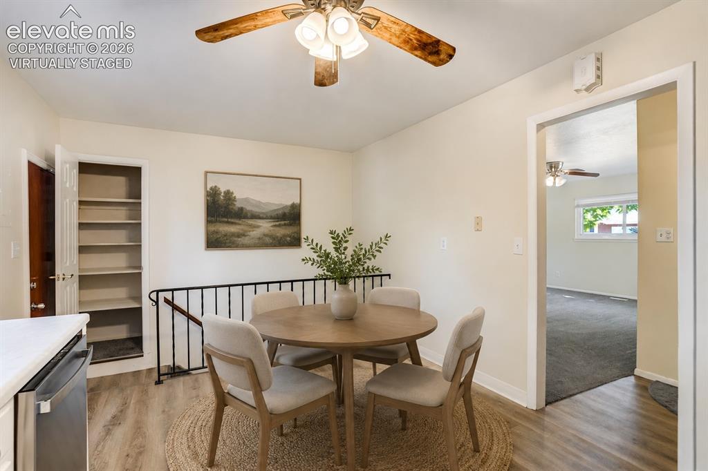 Image 13 of 50: Virtually staged eat-i dining area