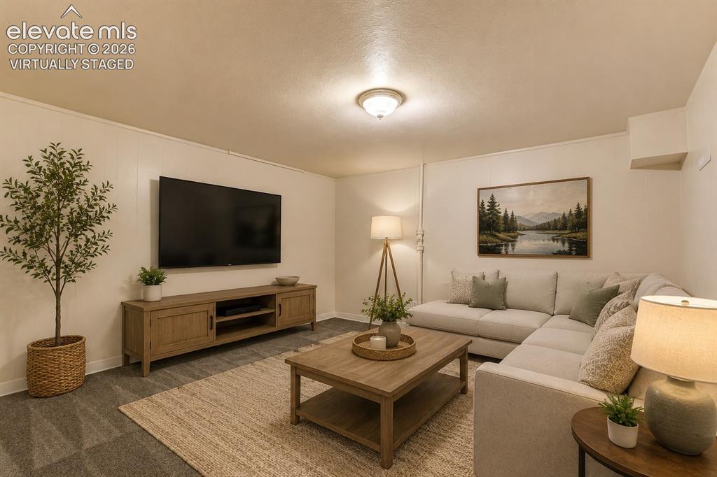 Image 25 of 50: Virtually staged family room