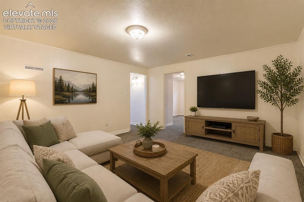 Image 27 of 50: Virtually staged family room