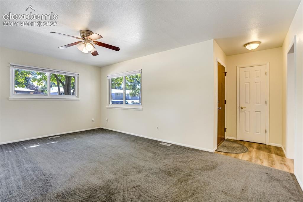 Image 6 of 50: Living Room & Entry