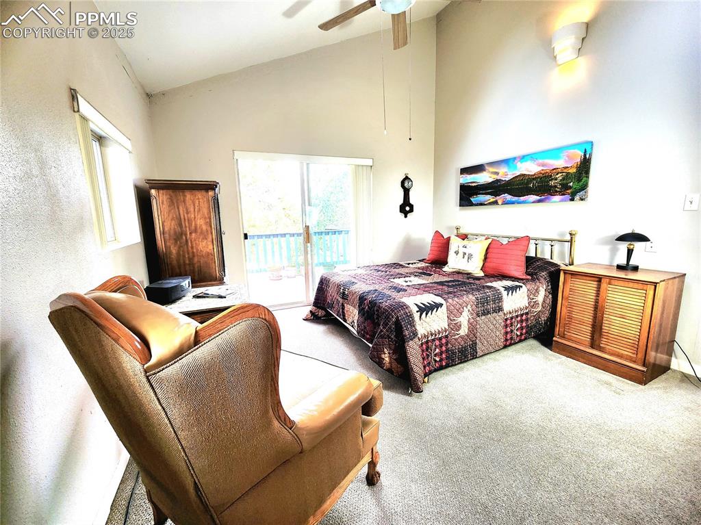 Image 15 of 50: 2nd bed has great views and walks out to large front deck