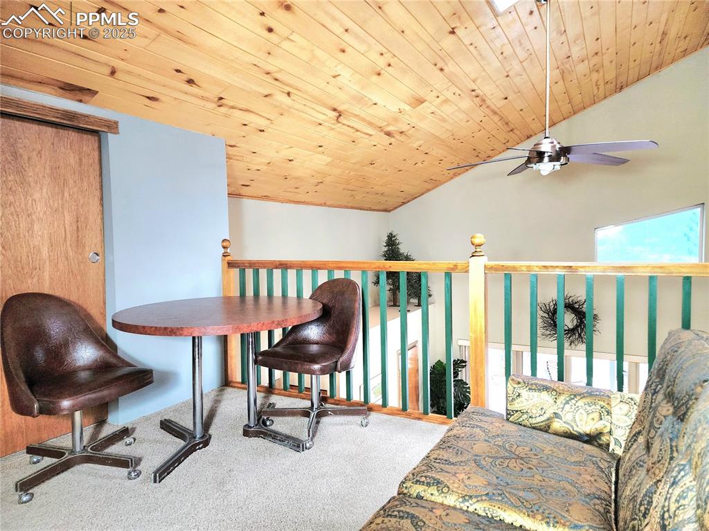 Image 24 of 50: Loft is spacious with room for sitting area and sleeping area, and has 2 cl