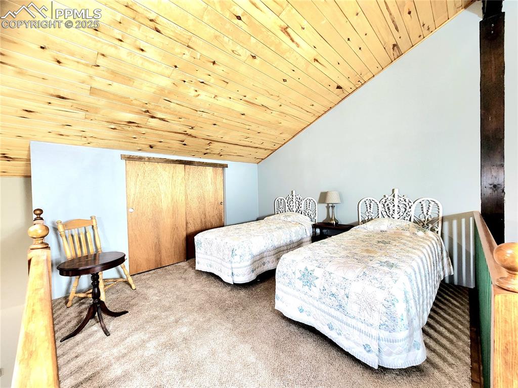 Image 27 of 50: in Loft, has 2 closets, one on each end