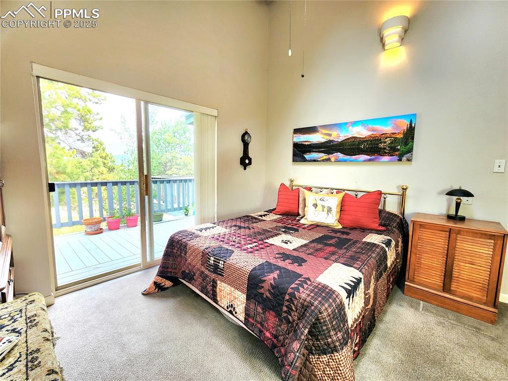 Image 3 of 50: 2nd Bed located off the LR on the East end of the home past the dining area