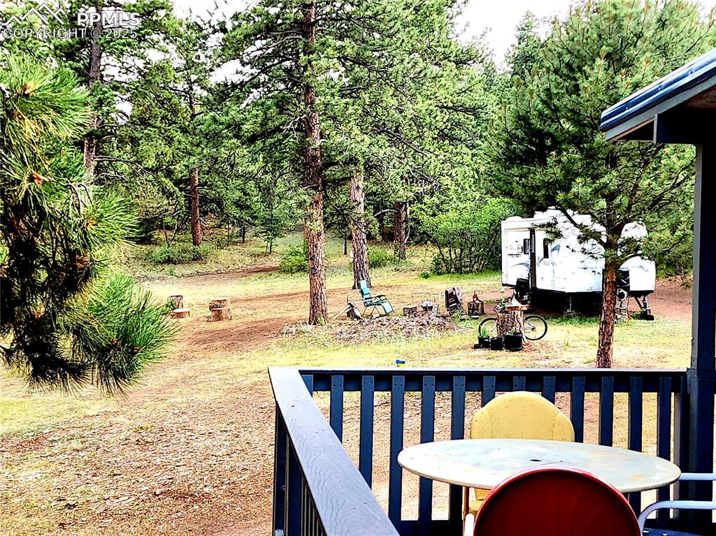 Image 44 of 50: gently sloping, level side yard great for your guest RV parking