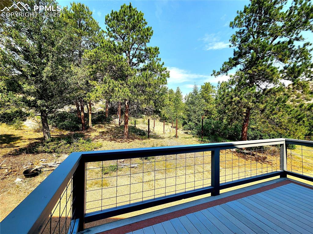 Image 47 of 50: Back deck to main entry
