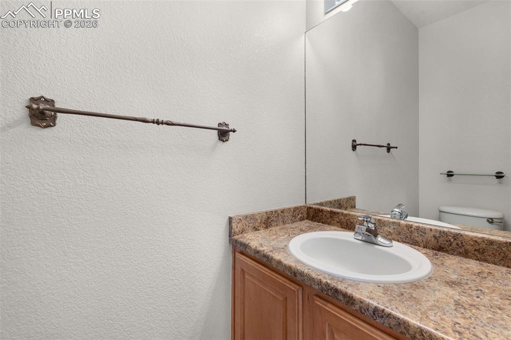 Image 14 of 50: Half Bath On Main Level