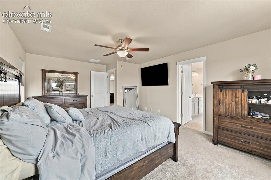 Image 21 of 31: Master Bedroom