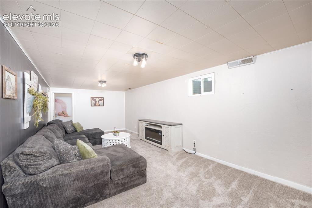 Image 15 of 35: Basement Living Room