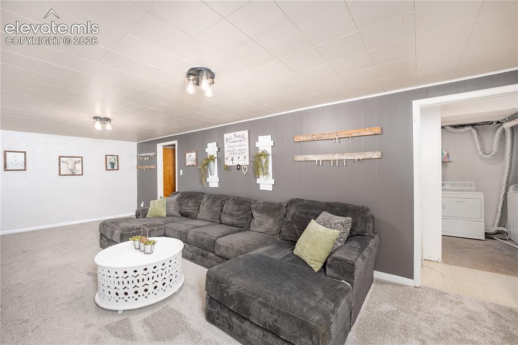 Image 16 of 35: Basement Living Room
