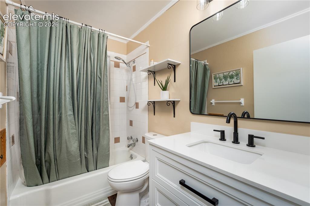 Image 7 of 35: Hallway Bathroom