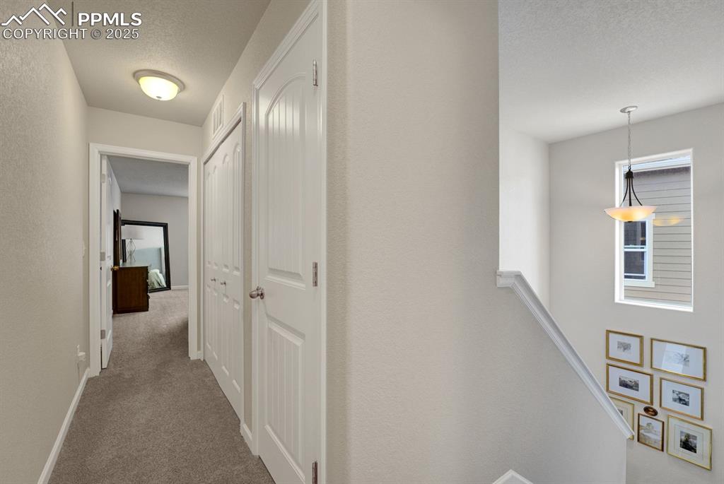 Image 12 of 25: The two upstairs bedrooms are BEAUTIFUL.
