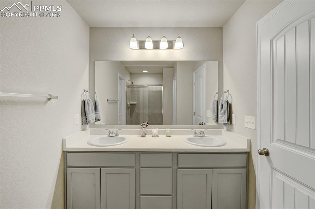 Image 15 of 25: The master bathroom is beautiful with dual vanities and an oversized free s