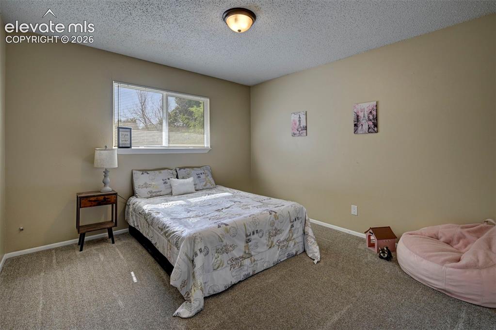 Image 18 of 48: Bedroom