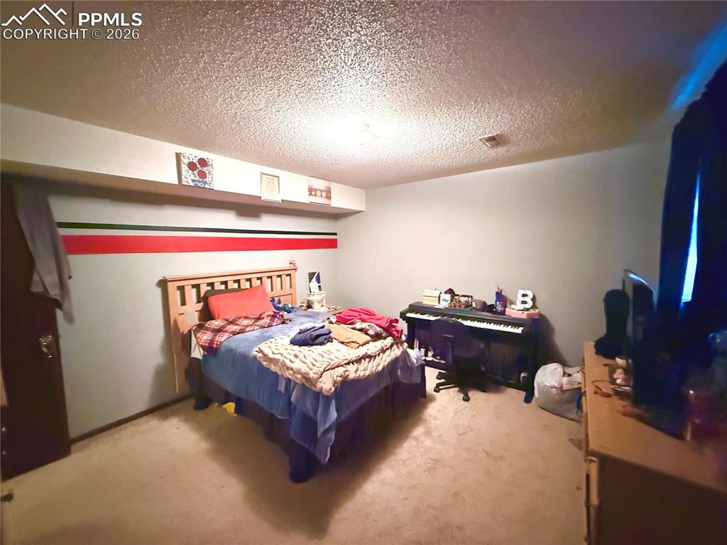 Image 16 of 23: Bedroom