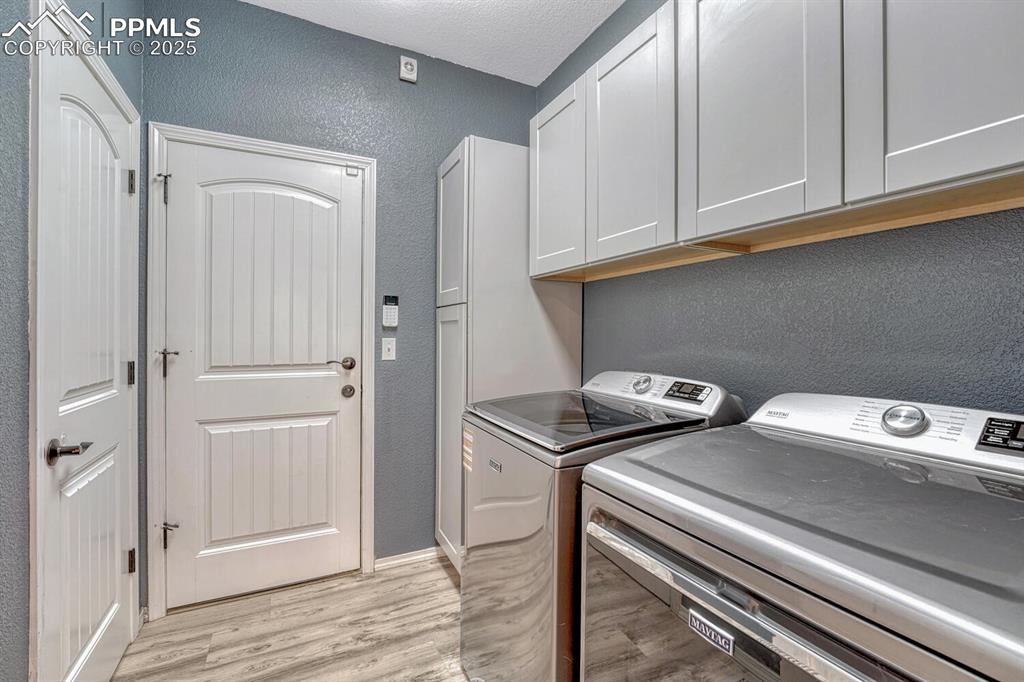 Image 14 of 41: Discover a laundry facility that combines functionality with style, boastin