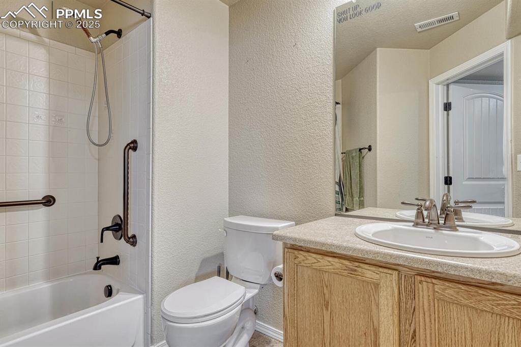 Image 27 of 41: Experience the perfect blend of style and functionality in this full bath,