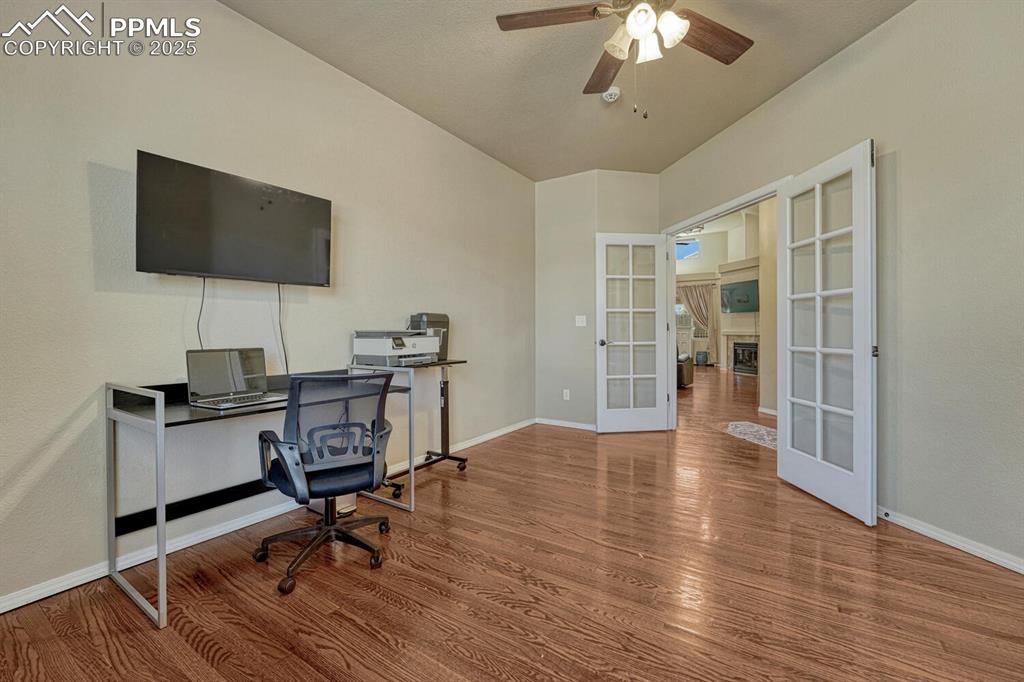 Image 3 of 41: Elevate your workspace in this beautifully appointed office area, complete