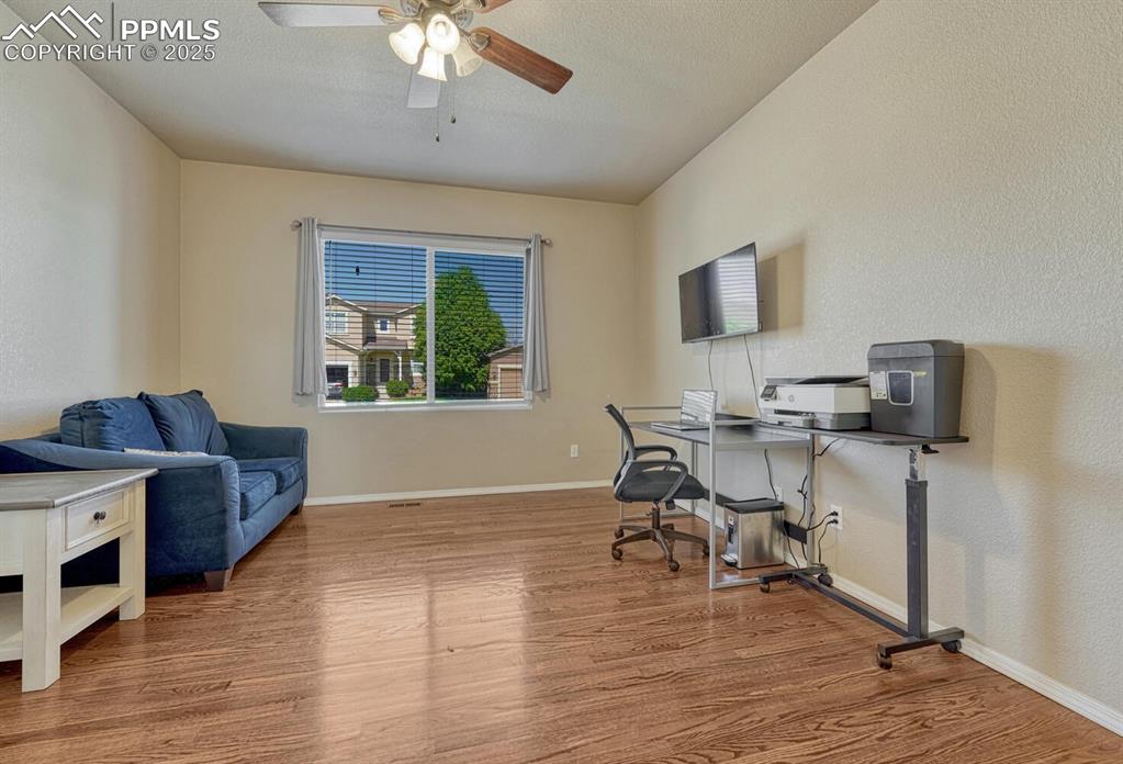 Image 4 of 41: Elevate your workspace in this beautifully appointed office area, complete