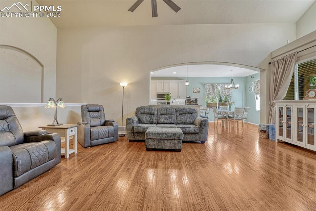 Image 9 of 41: Step into a bright and airy living room, where elegant arched walkways, lig