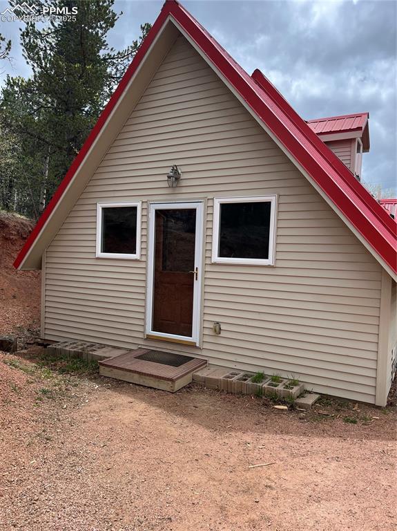 Image 13 of 13: Park at back of the home and enter in "other room" and laundry area