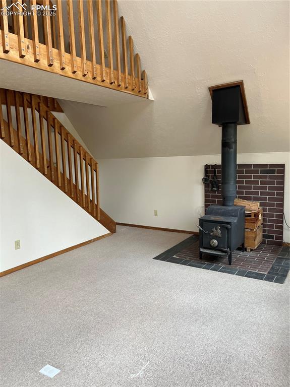 Image 5 of 13: stairs lead up to loft bedroom