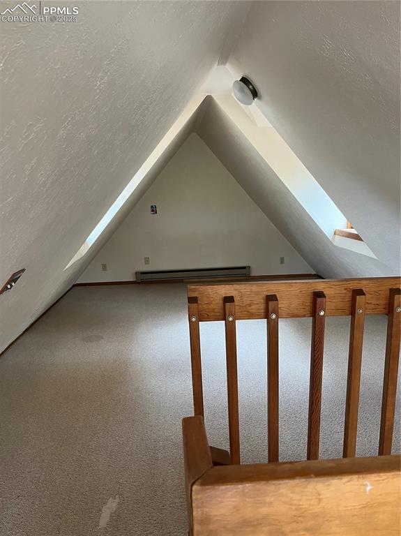 Image 6 of 13: extra bedroom (non conforming) or??? over looks the living room