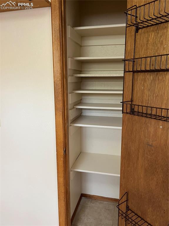 Image 8 of 13: Kitchen pantry for some added storage