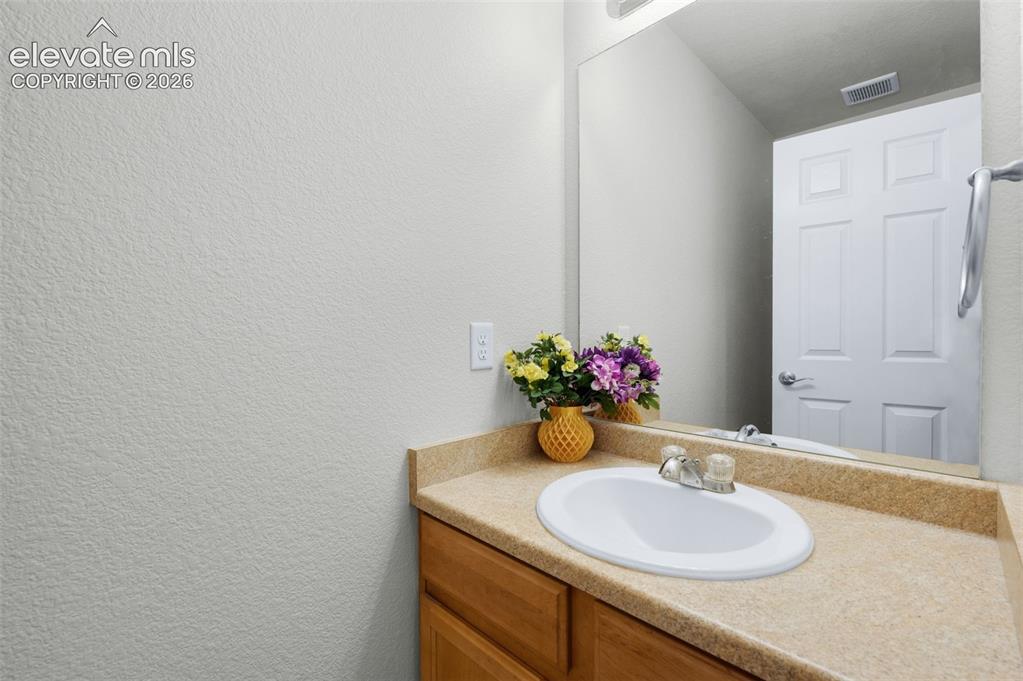 Image 16 of 50: Half Bathroom on the main level.