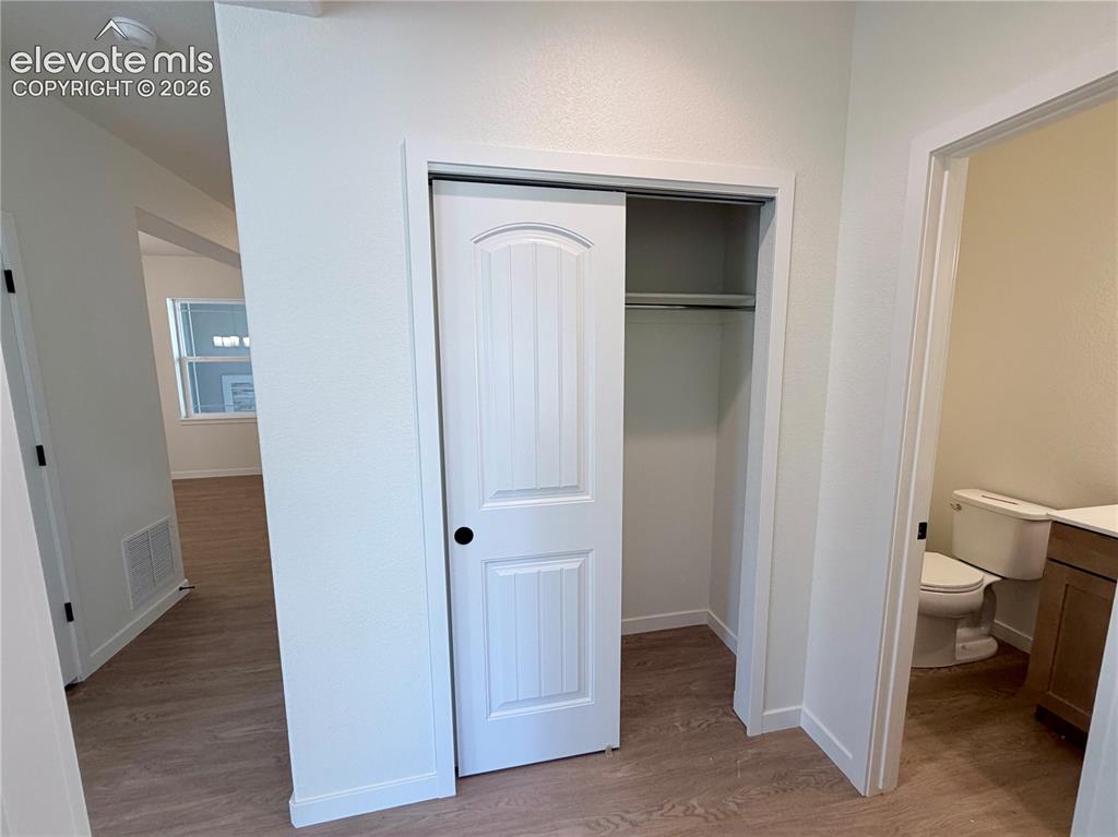 Image 15 of 46: Large Hall Closet in the hallway off the Study