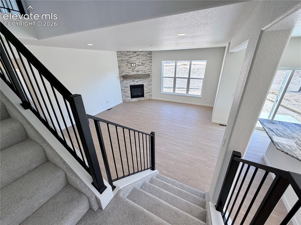 Image 19 of 46: Stairs to Upper Level