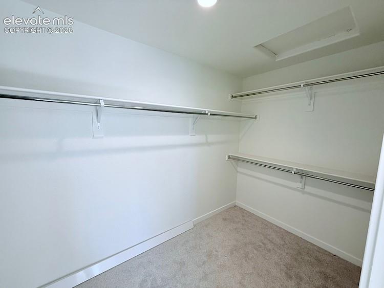 Image 24 of 46: Primary Bedroom Walk-in Closet