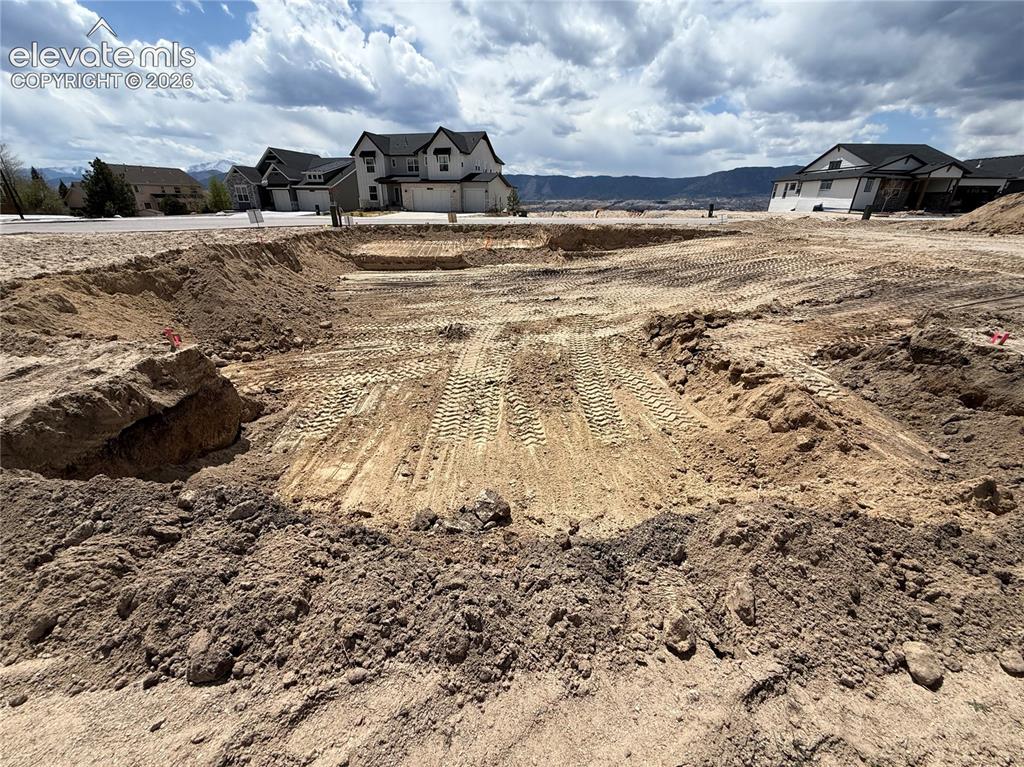 Image 3 of 8: Excavation as viewed from the rear of the lot