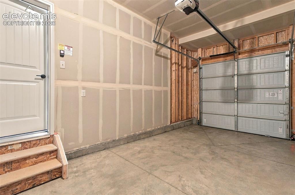 Image 45 of 49: 1 Car Frontload Garage
