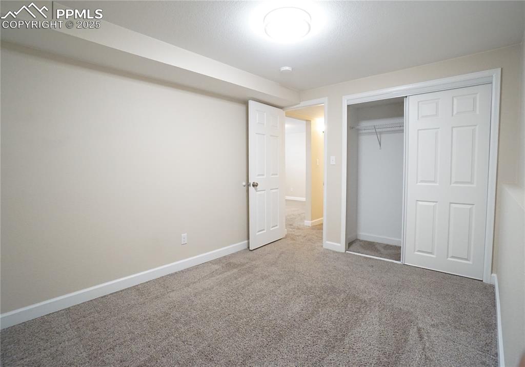 Image 27 of 38: Bedroom