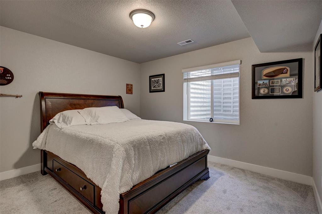 Image 22 of 28: Bedroom