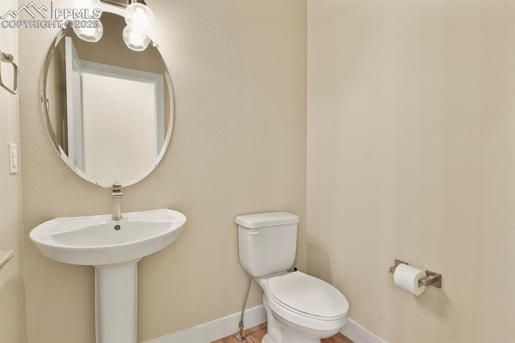 Image 16 of 29: Half bath on main level