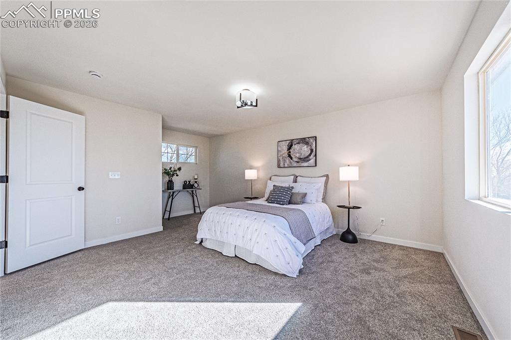 Image 17 of 31: Master Bedroom