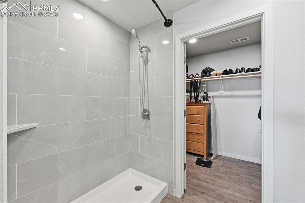 Image 15 of 29: Walk in shower