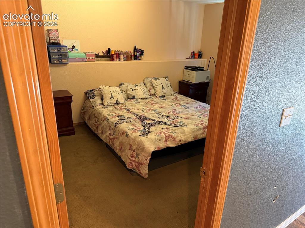 Image 23 of 49: Bedroom