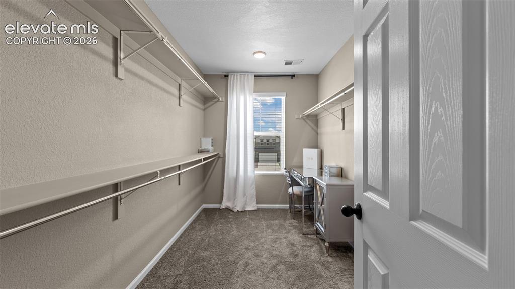 Image 22 of 38: Walk-In Closets